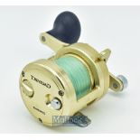 Shimano Trinidad multiplier reel TN12 in gold finish^ marked Japan to the foot^ power handle^ 6:2: