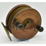 Large wooden and brass Nottingham star back big game reel 5 ½” dia’ twin handle^ on off check^ brass