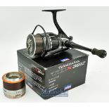 Daiwa TDX 3012 spinning reel in black^ single handle^ with spare spool^ runs smoothly^ signs of