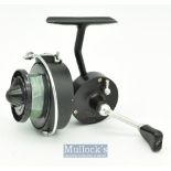 Mitchell 304 C.A.P spinning reel in black finish^ full bail^ marked 045814 with line^ in good