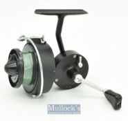 Mitchell 304 C.A.P spinning reel in black finish^ full bail^ marked 045814 with line^ in good