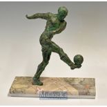 20thc large spelter figure of a football figure volleying the ball - mounted on a long rectangular