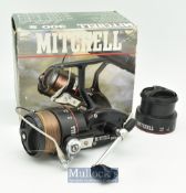 Mitchell 300S spinning reel in black with skirted spool^ full bail^ with line^ plus spare spool in