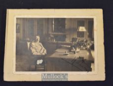 WWII Adolf Hitler Signed Photograph depicted in civilian clothes sat, signed and ink to the front