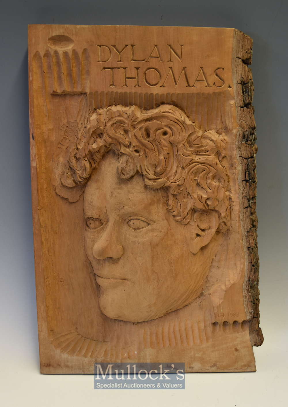 Dylan Thomas Portrait Wood Carving: Carved from one piece of wood and signed JH 1983^ 50 x 36cm