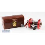 ABU Ambassadeur 6000 multiplying reel in red with maker’s case stamped 009090 to the foot^ counter