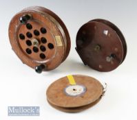 Large Unnamed wood and brass 9 ½” Sea centre pin reel with perforations to centre^ twin handles^