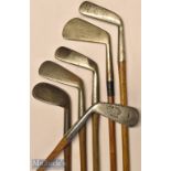 Interesting assortment of well-known makers hickory and palakona shafted golf irons (6) Jack White