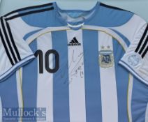 Signed Diego Maradona Argentina Football Shirt in ink to the front^ blue and white^ framed