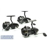 3x Mitchell 300 fixed spool reels all in black with full bail arms, all appear with minor signs of