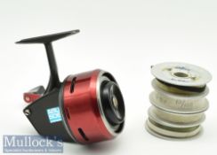 ABU 505 closed face reel in red and black, appears with 4 spare spools, appears in good condition