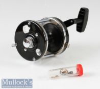 Abu Ambassadeur 9000C Multiplier Sea Reel in black finish^ automatic two speed^ runs smoothly with