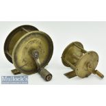 2x Brass crank wind reels to include an unnamed 3 ½” 3x pillar reel with ebony handle^ smooth foot