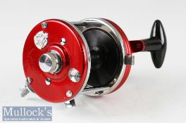 Abu Ambassadeur 9000 Multiplier Sea Reel in red finish^ automatic two speed^ runs smoothly with