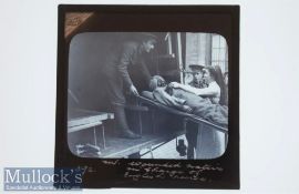 WWI Original Glass slide showing a wounded Sikh soldier taken to an ambulance on a stretcher by an