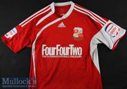 2010/11 Austin Signed Swindon Town Match Worn football shirt No 32 red short sleeve, signed to