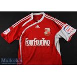 2010/11 Austin Signed Swindon Town Match Worn football shirt No 32 red short sleeve, signed to