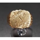 NINE CARAT GOLD SIGNET RING with engraved N and scroll decoration, ring size O and approximately 4.2