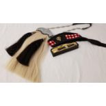MILITARY STYLE SPORRAN with white horse hair and two black horse hair tassels, with a fancy square
