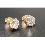 PAIR OF DIAMOND STUD EARRINGS the diamonds totalling approximately 1ct, in fourteen carat gold