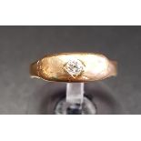 DIAMOND SOLITAIRE RING the flush set diamond in eighteen carat gold, ring size G and approximately