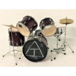 SESSION PRO DRUM KIT comprising four drums with deep red coloured bodies, snare drum, two cymbals