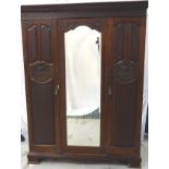 EDWARDIAN MAHOGANY BEDROOM SUITE comprising a wardrobe with a moulded dentil cornice above a