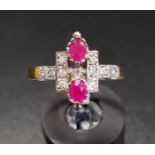 ART DECO STYLE RUBY AND DIAMOND PLAQUE RING the two oval cut rubies within a diamond set geometric