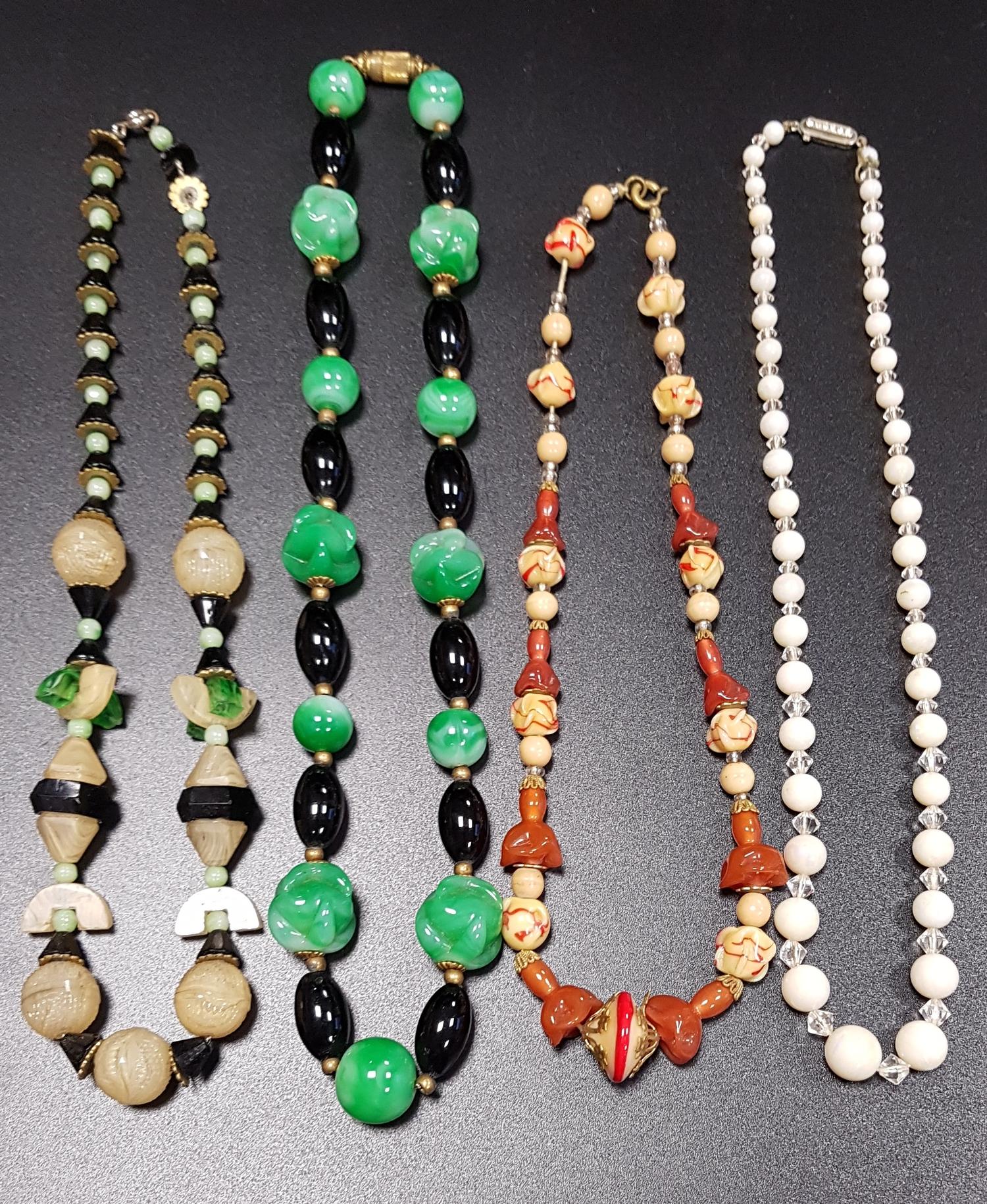 FOUR VINTAGE BEAD NECKLACES comprising a jade coloured hardstone and black agate example, a