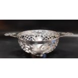 GEORGE V PIERCED SILVER CENTRE BOWL in the form of a quaich, Sheffield 1934, 348 grams