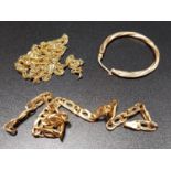 SELECTION OF NINE CARAT GOLD JEWELLERY comprising a bracelet, a twist chain necklace, and a single