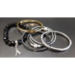 SELECTION OF FASHION JEWELLERY including two Michael Kors pave set logo plaque bangles, one in