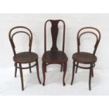 PAIR OF BENTWOOD DINING CHAIRS with shaped backs above circular elm seats, standing on front