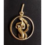 EIGHTEEN CARAT GOLD MERMAID PENDANT the outer circle with relief moulded mermaid within,