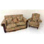 MEDALLION MAHOGANY FRAME TWO SEAT SOFA with a padded back and scroll arms with loose seat cushions