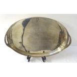 LARGE SILVER PLATED OVAL TRAY with reeded sides and pierced handles, 56cm wide