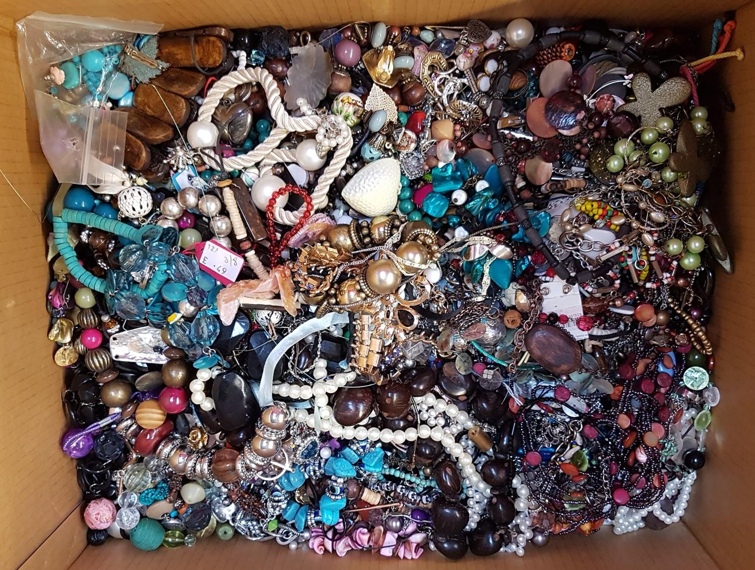 LARGE SELECTION OF COSTUME JEWELLERY including rings, beads, necklaces and brooches