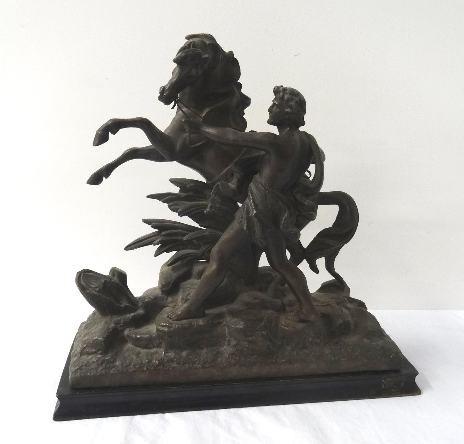 TWO SPELTER FIGURINES each depicting a man trying to control a rearing horse, raised on ebonised - Image 3 of 3