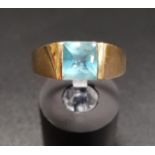 BLUE TOPAZ SINGLE STONE RING on ten carat gold shank, ring size N-O