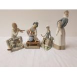 THREE LLADRO FIGURINES comprising a young girl holding a lamb, 27.5cm high, a seated young girl with