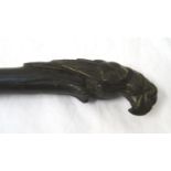 19th CENTURY EBONISED WALKING CANE of tapering form with bone inlay, the bronze handle modelled as a