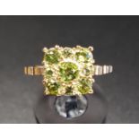 PERIDOT CLUSTER RING the nine graduated peridots in square setting, on nine carat gold shank, ring