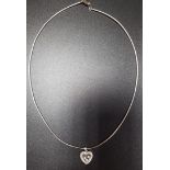 DIAMOND SET HEART SHAPED LOCKET STYLE PENDANT the diamond border around a glazed panel containing