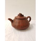 20TH CENTURY CHINESE POTTERY TEA POT of squat form the lid with crab finial, the interior with