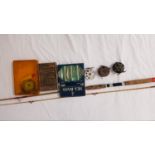 RICHMANN 7' SPINNING ROD in two section fibreglass with a cloth bag, together with three reels and