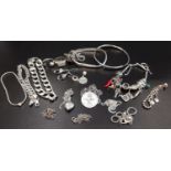 SELECTION OF SILVER JEWELLERY including a heavy curb link bracelet, a silver charm bracelet with