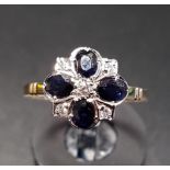 SAPPHIRE AND DIAMOND CLUSTER RING on nine carat gold shank, ring size M-N