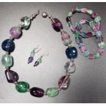 SUITE OF CRYSTAL JEWELLERY comprising an irregular bead necklace, two irregular bead bracelets and a