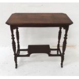 EDWARDIAN OAK OCCASIONAL TABLE with an oblong top with canted corners, standing on turned and