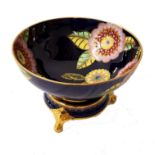 CARLTON WARE CENTRE BOWL decorated in the Melange pattern with a navy blue ground and gilt